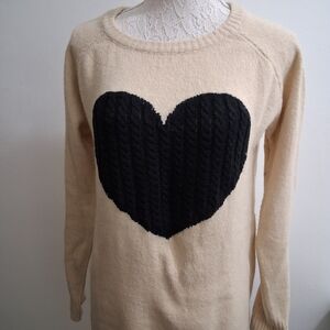 Elegant Cream Sweater with Black Heart Accent